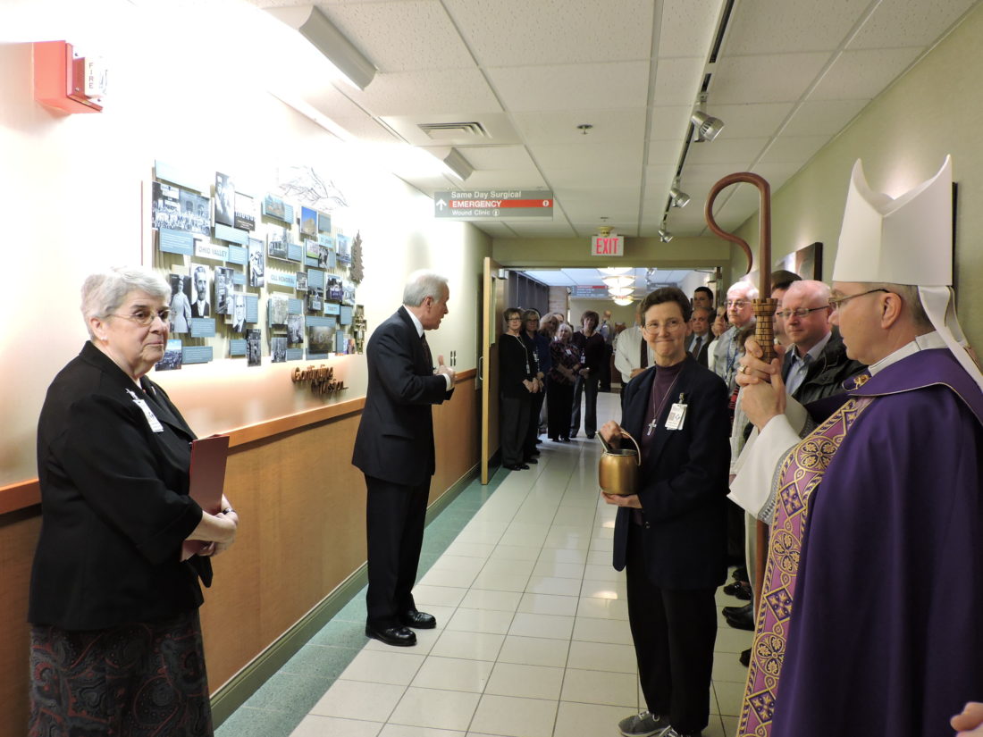 Heritage display wall dedicated at Trinity Medical Center West in